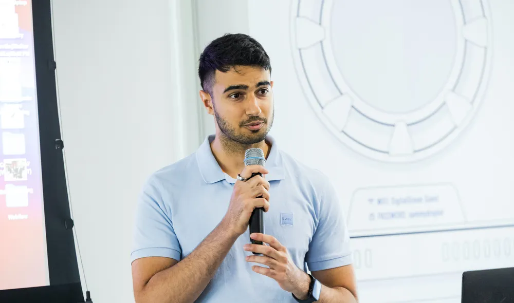Speaking into a microphone during a presentation